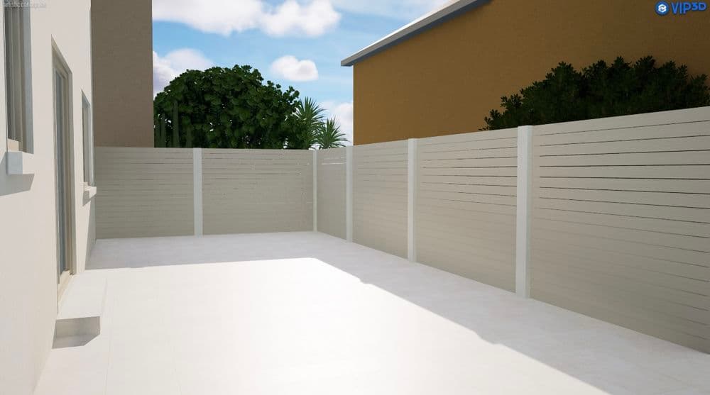 Modern outdoor patio with white fencing, surrounded by greenery and blue sky.